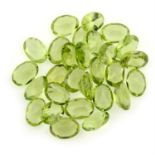 A selection of oval-shape peridots, total weight 20.95cts.
