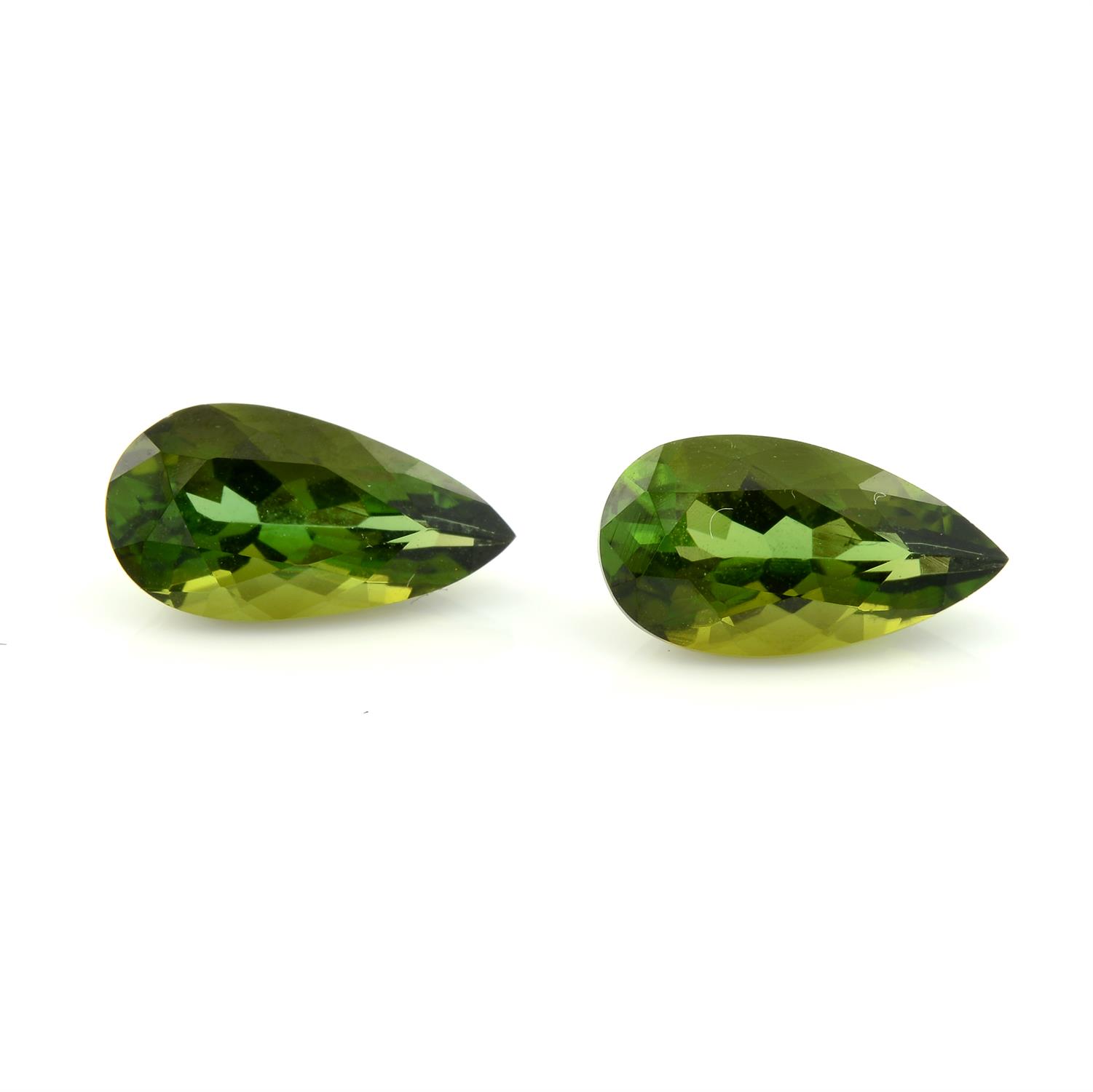 Two pear-shape green tourmalines, weight 1.39cts and 1.33cts.