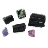 A selection of crystals, to include ruby, tanzanite, and tourmaline, total weight approximately 28.