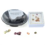 A selection of gemstones, including garnet, peridot, tourmaline, and emerald, total weight 17.