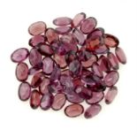 A selection of oval-shape purple garnets, total weight 30.22cts.