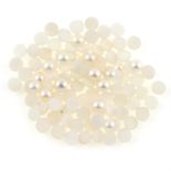 A selection of circular half-cut cultured pearls, total weight 8.5gms.