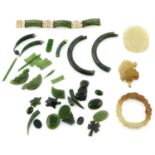 A selection of nephrite cabochons and jewellery, total weight approximately 234gms.