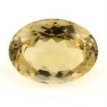 An oval-shape citrine, weight 33.08cts.