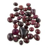 A selection of dark red vari-shape garnets, total weight 190cts.