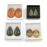 Four vari-shape gemstone pairs, to include rutilated quartz, amber and smokey quartz,