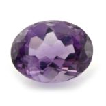 An oval-shape amethyst, weight 28.77cts.