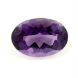 An oval-shape amethyst, weight 24.68cts.