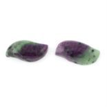 Two free-form ruby-zoisite cabochons, weight 9.85cts each.