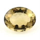 An oval-shape citrine, weight 30.15cts.