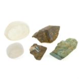 Five rough or partially polished gemstones, approximate gross weight 442gms.