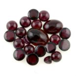 A selection of circular and oval-shape garnet cabochons, total weight 91.50cts.