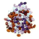 A selection of fancy oval-shape amethysts, citrines, blue topaz, garnets, totla weight 82.27cts.