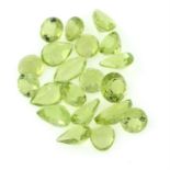 Twenty vari-shape peridots, total weight 13.60cts.