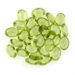 A selection of oval-shape peridots, total weight 21.93cts.