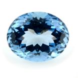 An oval-shape blue topaz, weight 24.72cts.