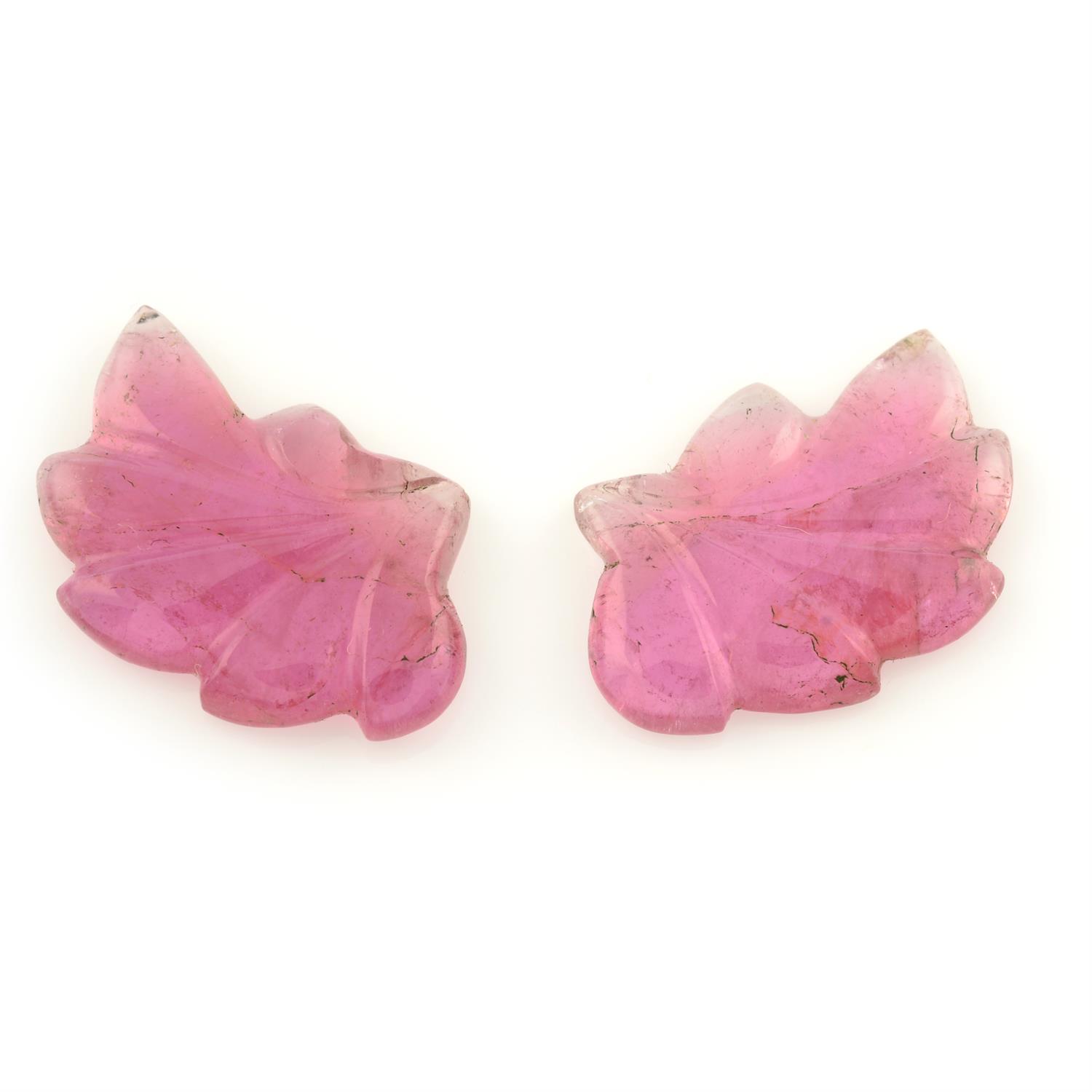 A pair of carved pink tourmalines, carved to depict leaves, weighing 7.51cts.