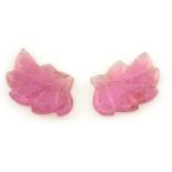 A pair of carved pink tourmalines, carved to depict leaves, weighing 7.51cts.