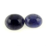 A pair of oval-shape iolite cabochons, total weight 7.33cts.