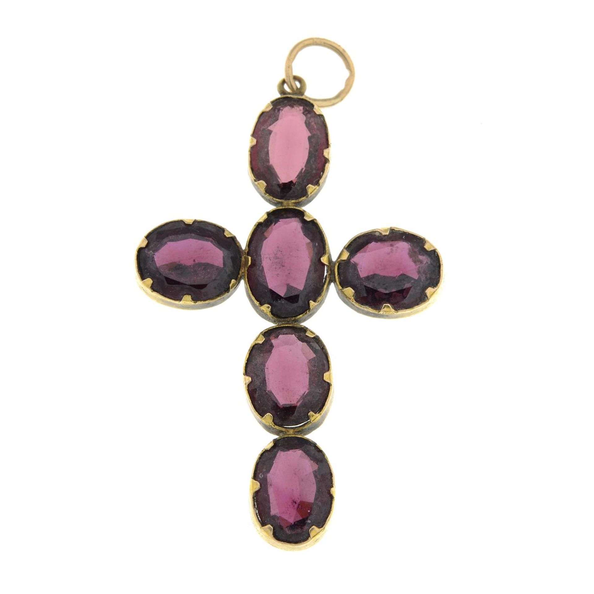 A Victorian gold garnet cross pendant.