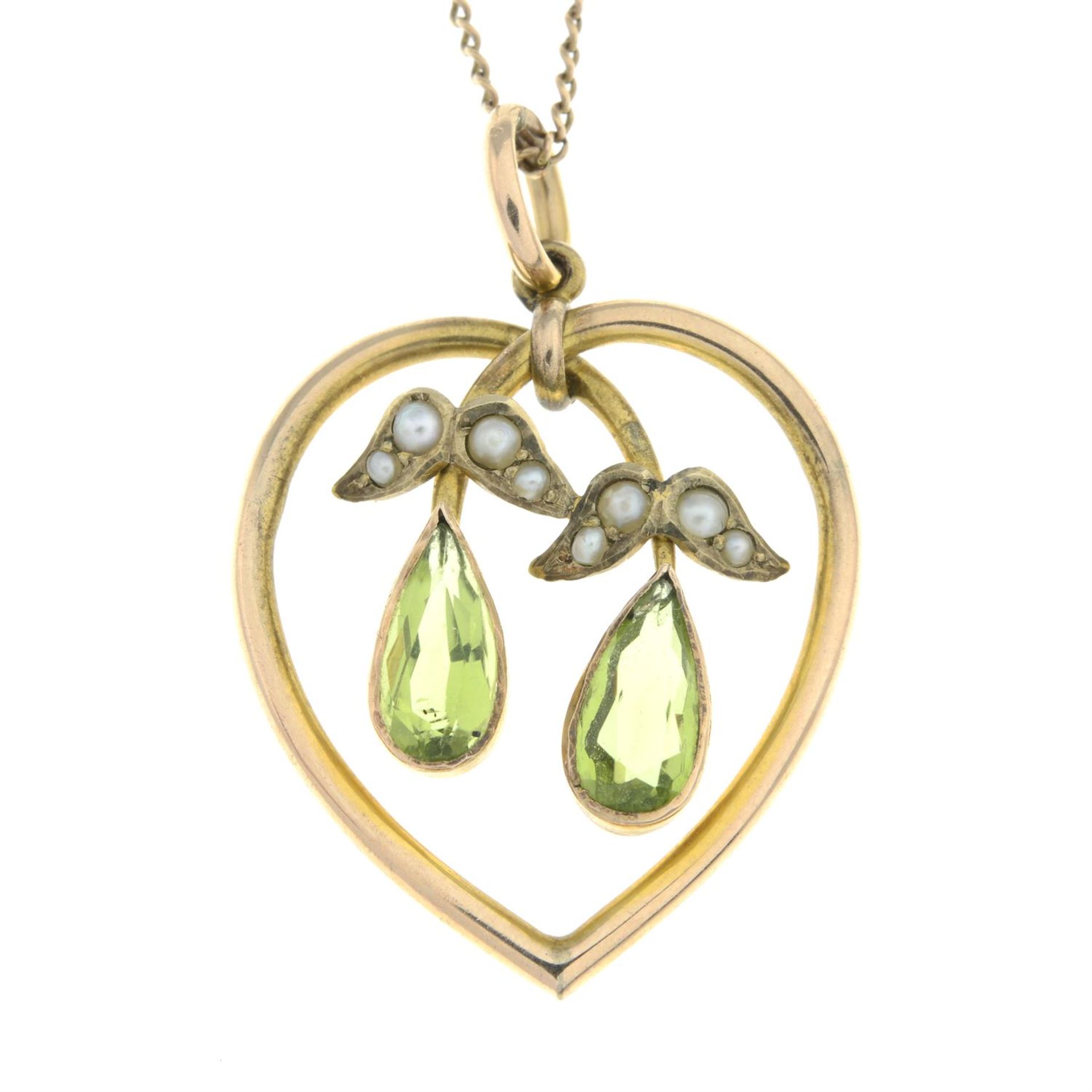 An Edwardian 9ct gold peridot and split pearl pendant, with 9ct gold chain.