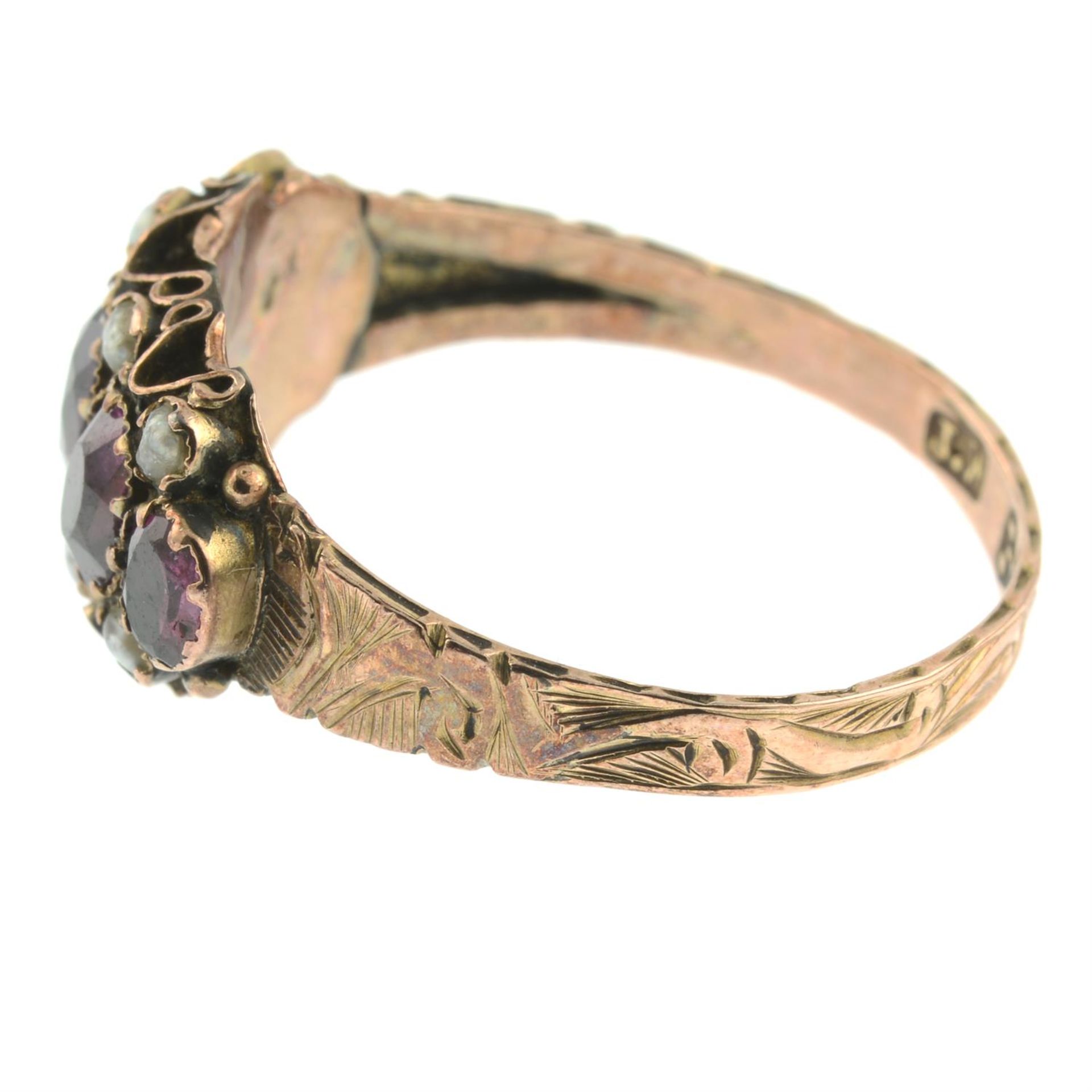 A Victorian 9ct gold garnet and split pearl dress ring. - Image 2 of 3