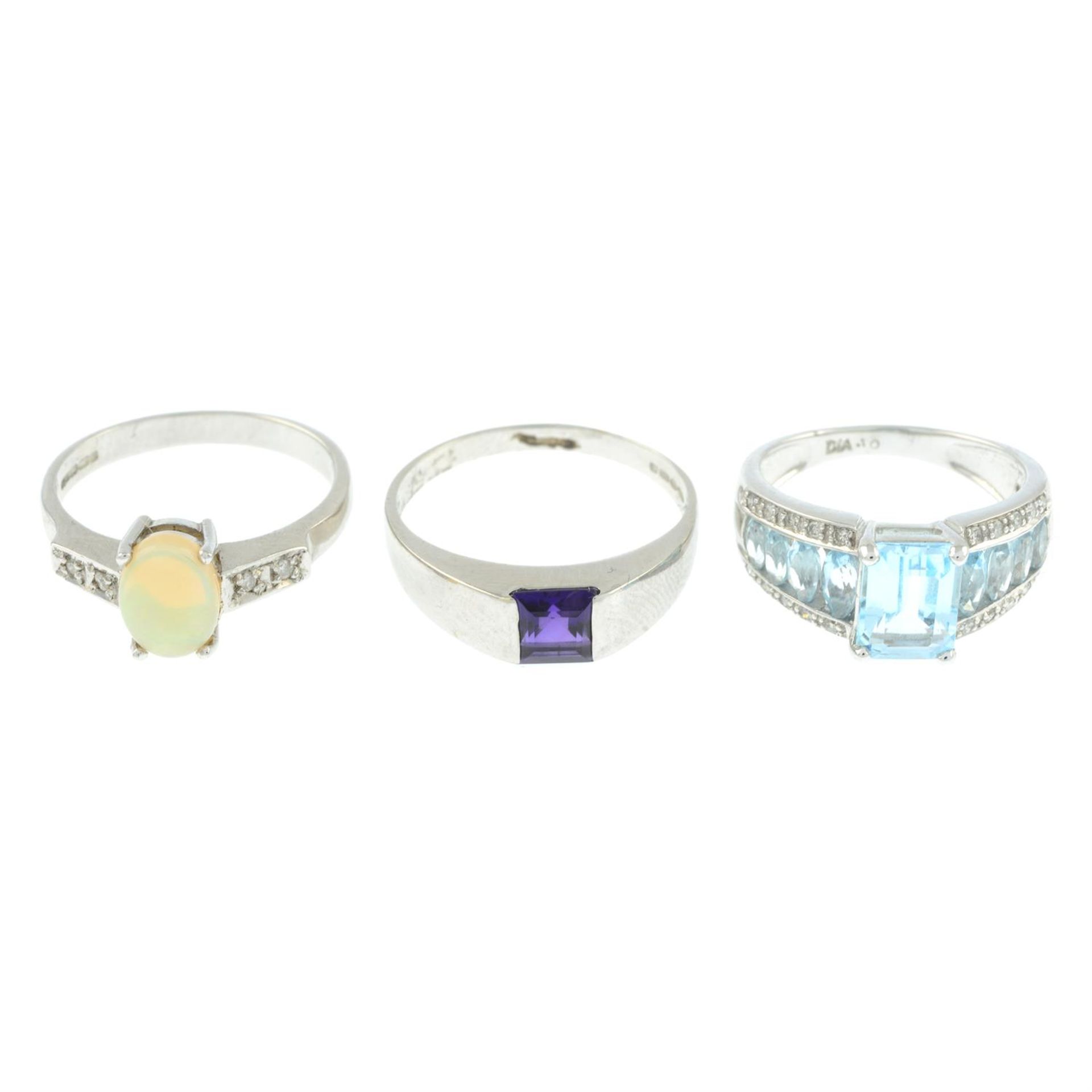 Three 9ct gold gem-set rings.