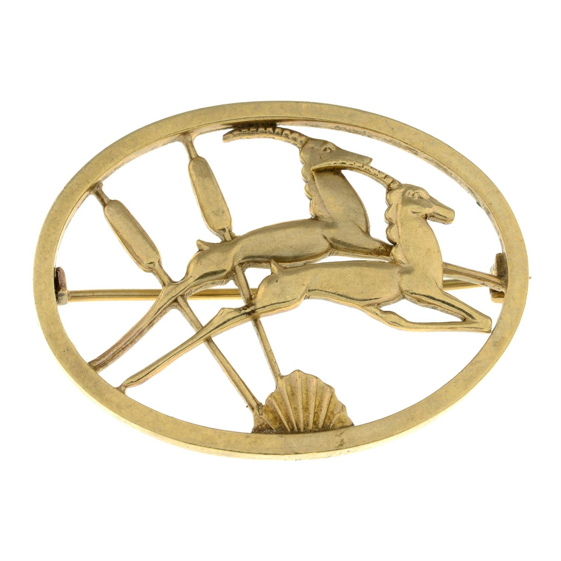 A 9ct gold leaping gazelle brooch, by Ivan Tarratt.