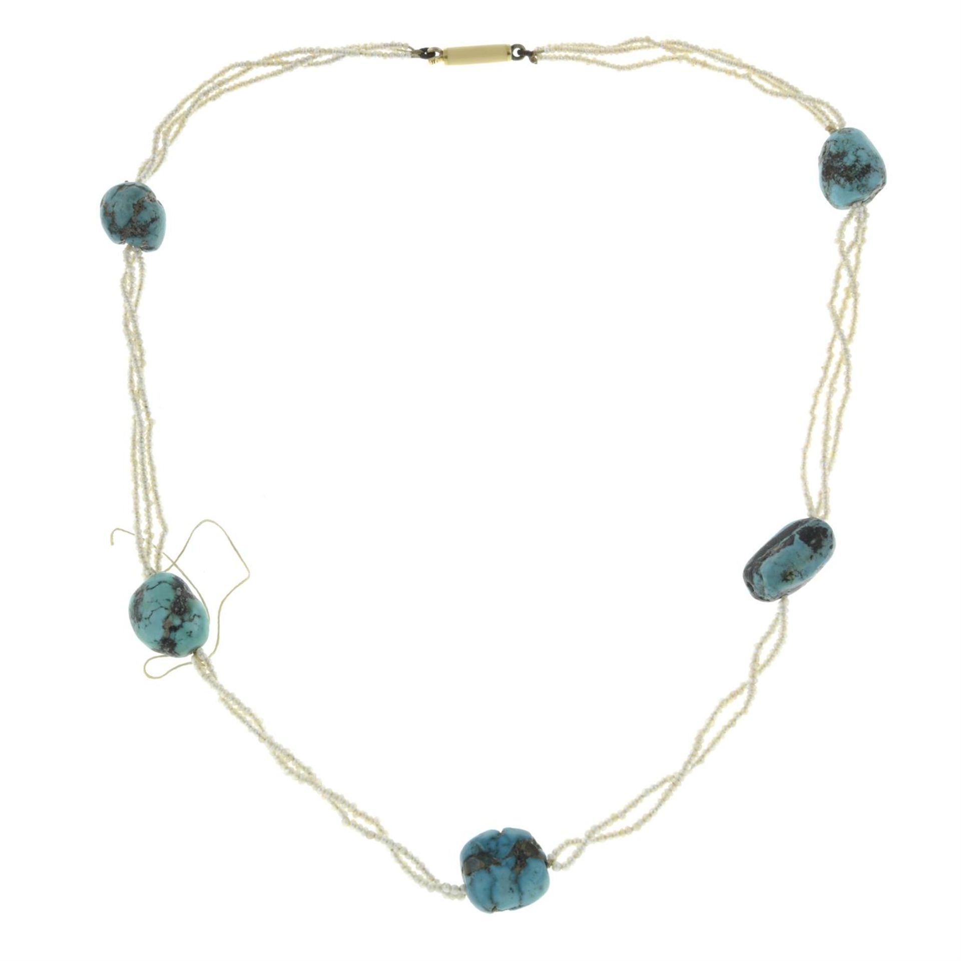 An early 20th century seed pearl three-row necklace, with turquoise bead spacers.