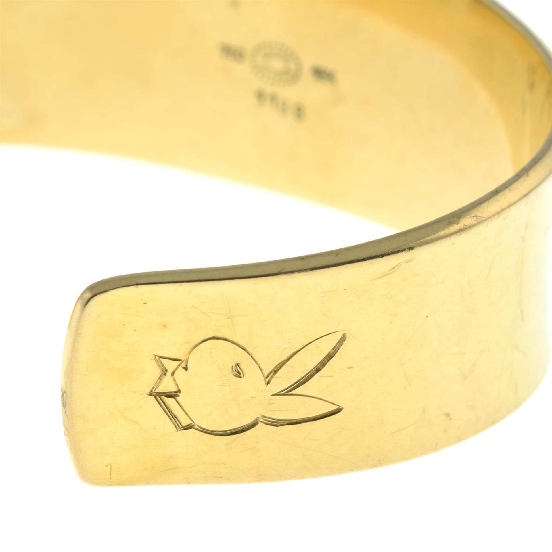 A 1970s 18ct gold flared bangle, by Georg Jensen, with later engraved bunny. - Image 3 of 5