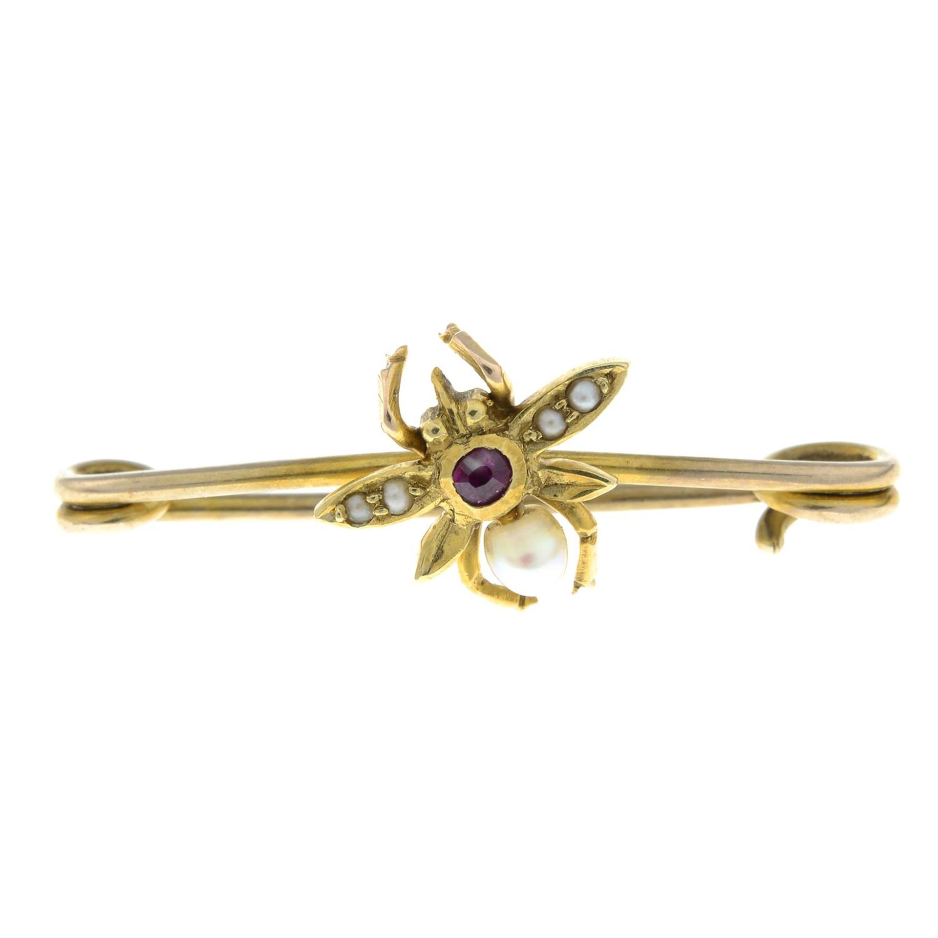 An early 20th century gold ruby, seed pearl and split pearl insect brooch.