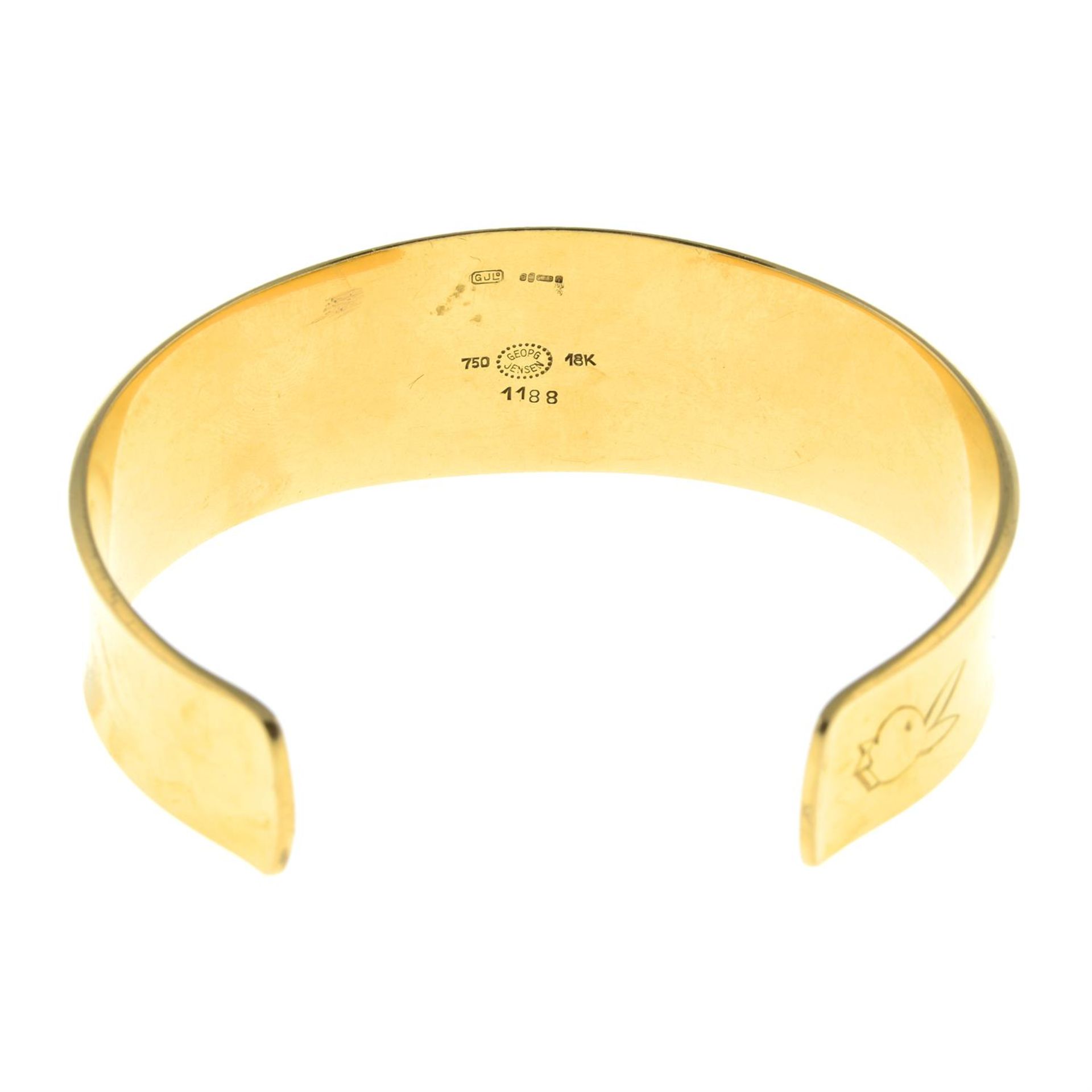 A 1970s 18ct gold flared bangle, by Georg Jensen, with later engraved bunny. - Image 2 of 5