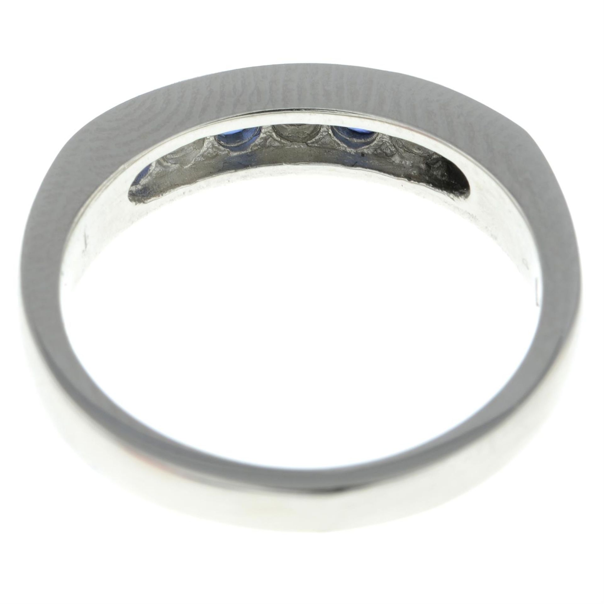 A platinum sapphire and brilliant-cut diamond half eternity ring. - Image 2 of 2
