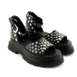 BURBERRY - a pair of black leather studded Barnsby platform sandals.