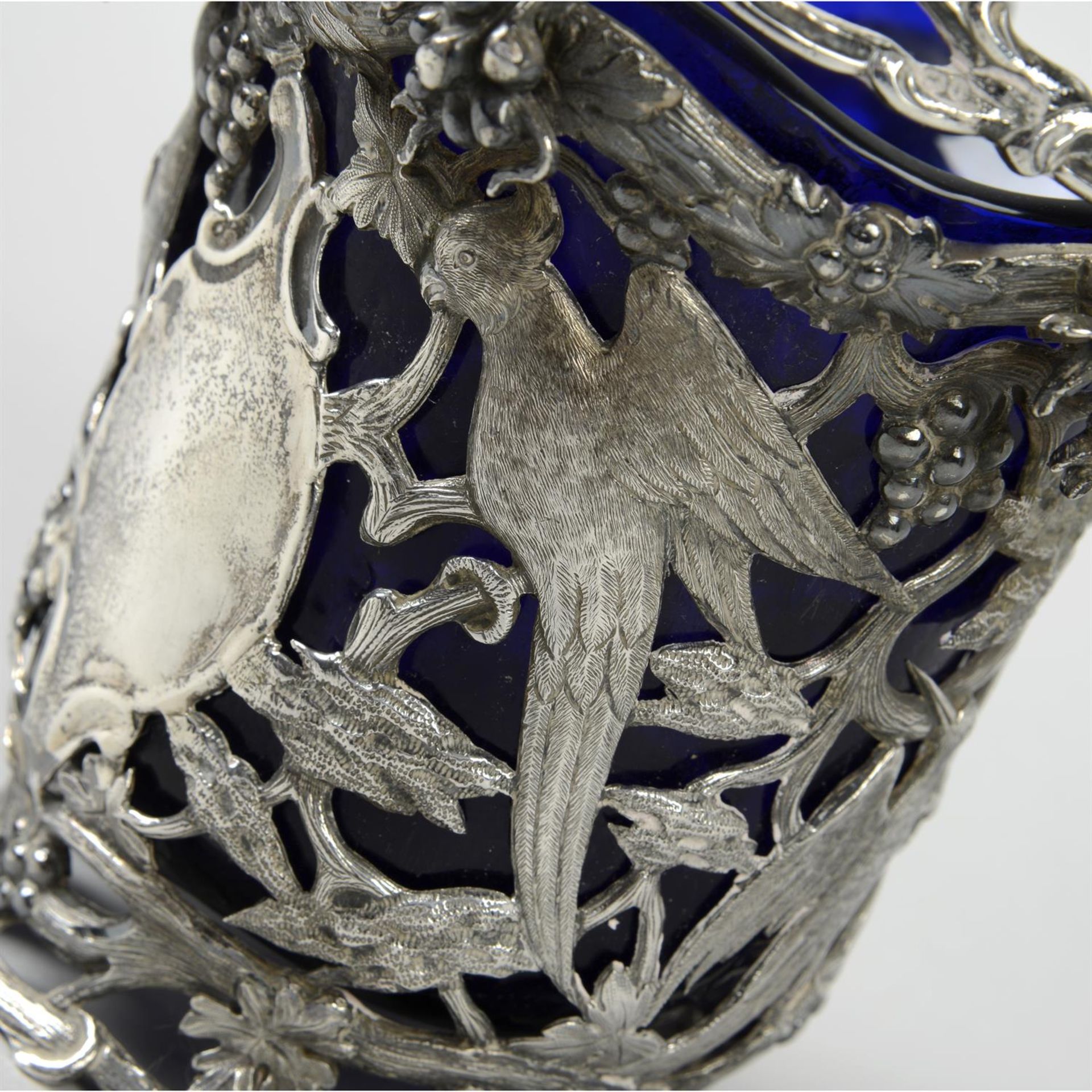 A mid-Victorian silver pierced swing-handled basket with glass liner. - Image 2 of 3