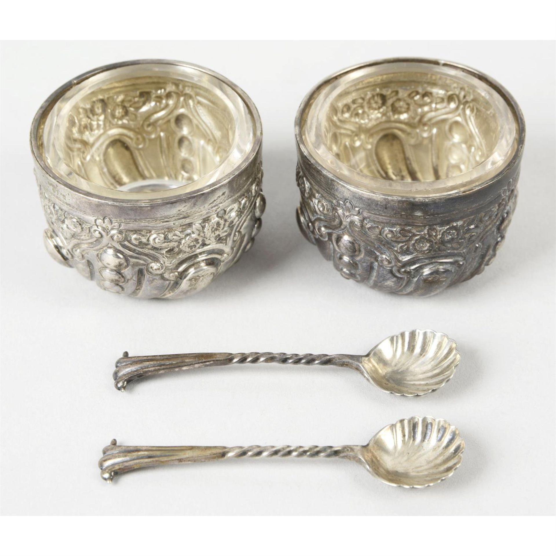 A pair of late Victorian silver open salts & pair of shell condiment spoons. (4)