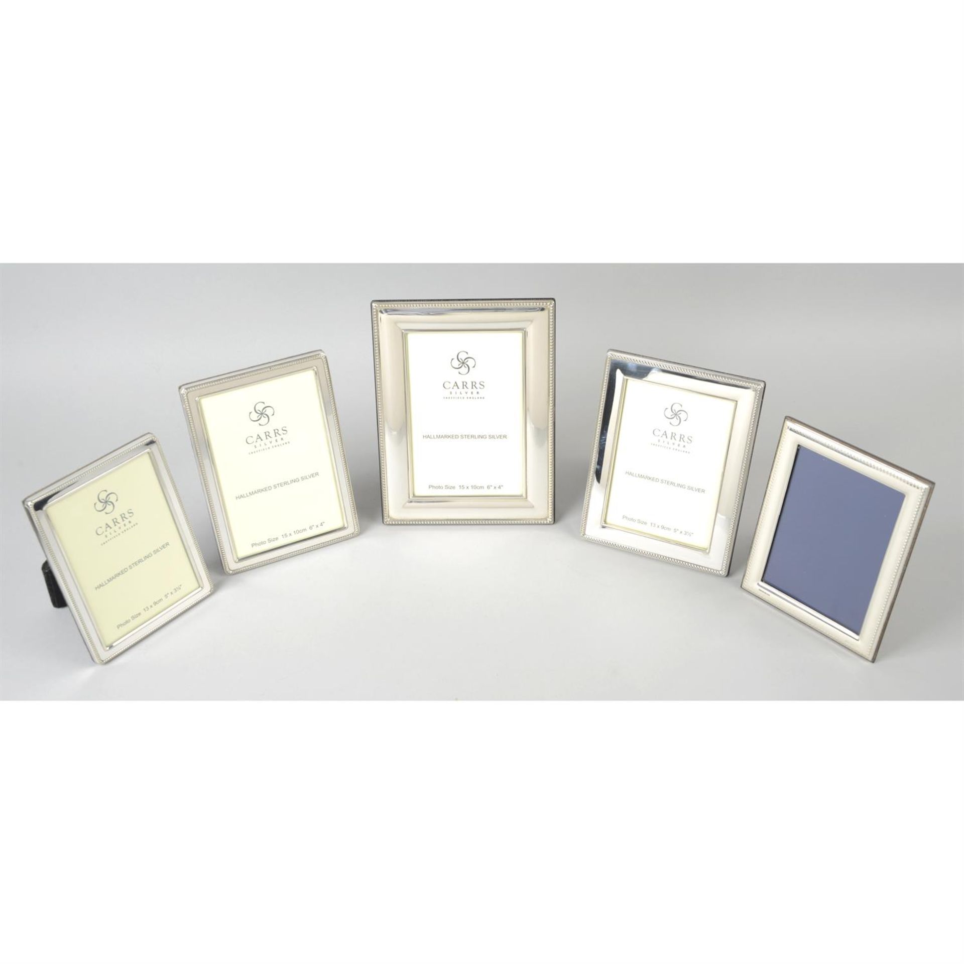 A selection of five modern silver mounted photograph frames. (5).