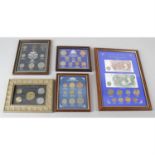 A selection of assorted framed and glazed coin or banknote display sets. (19)