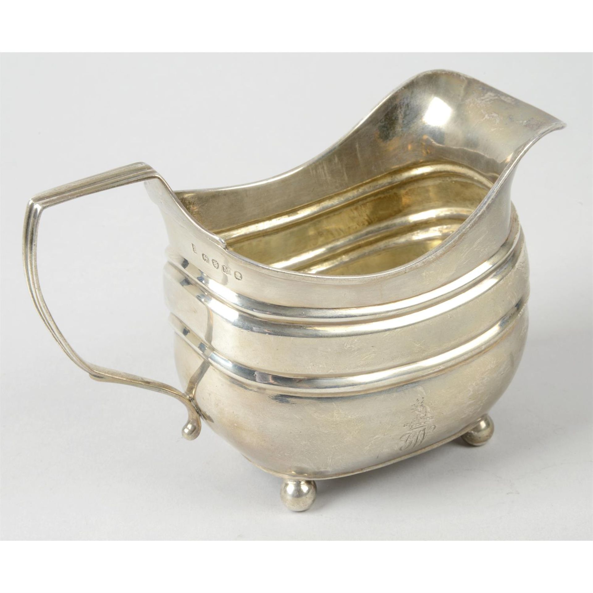 A George III silver cream jug. - Image 2 of 3