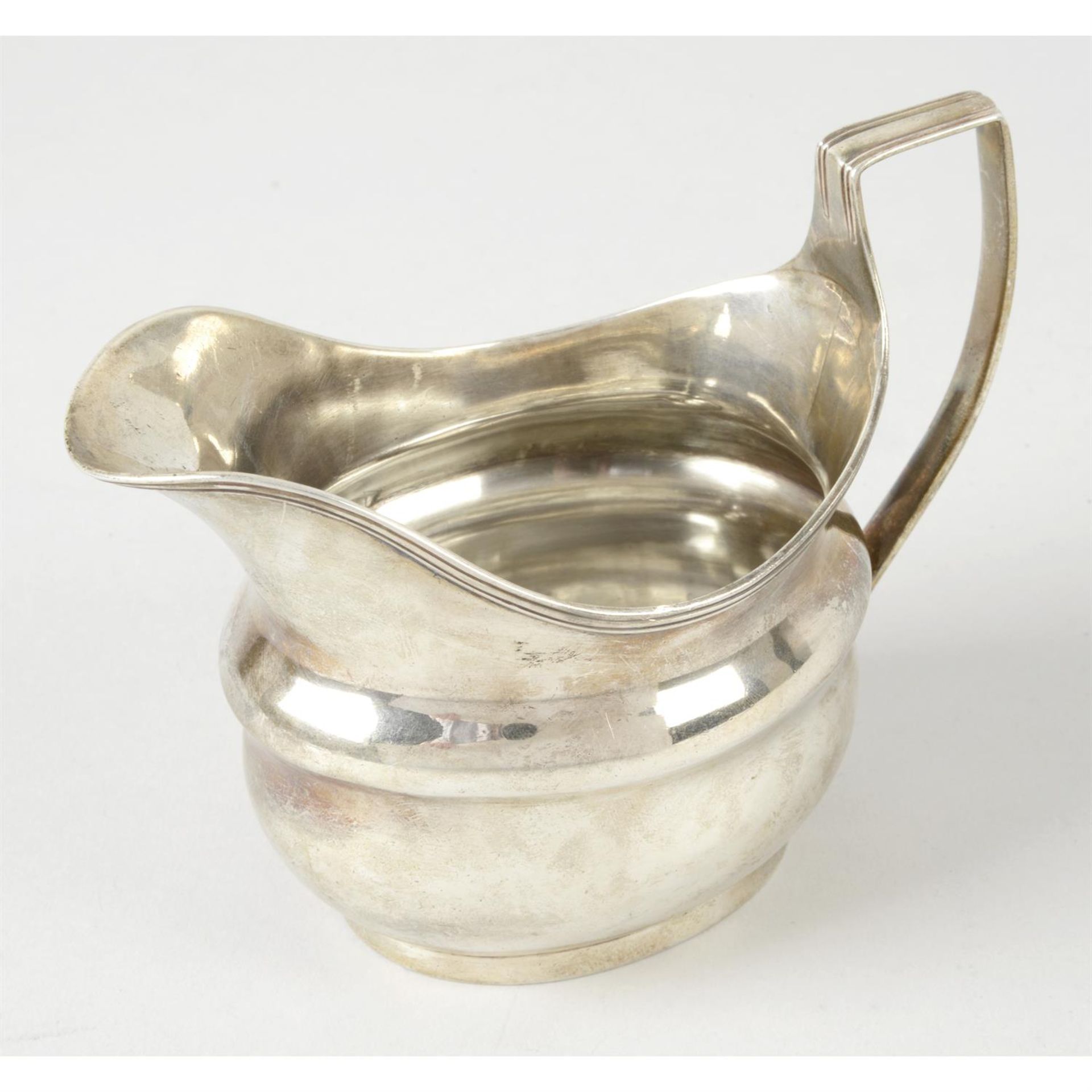 A George III silver cream jug.