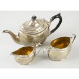 A George V silver three piece tea service.