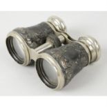 A pair of late Victorian silver mounted opera glasses.