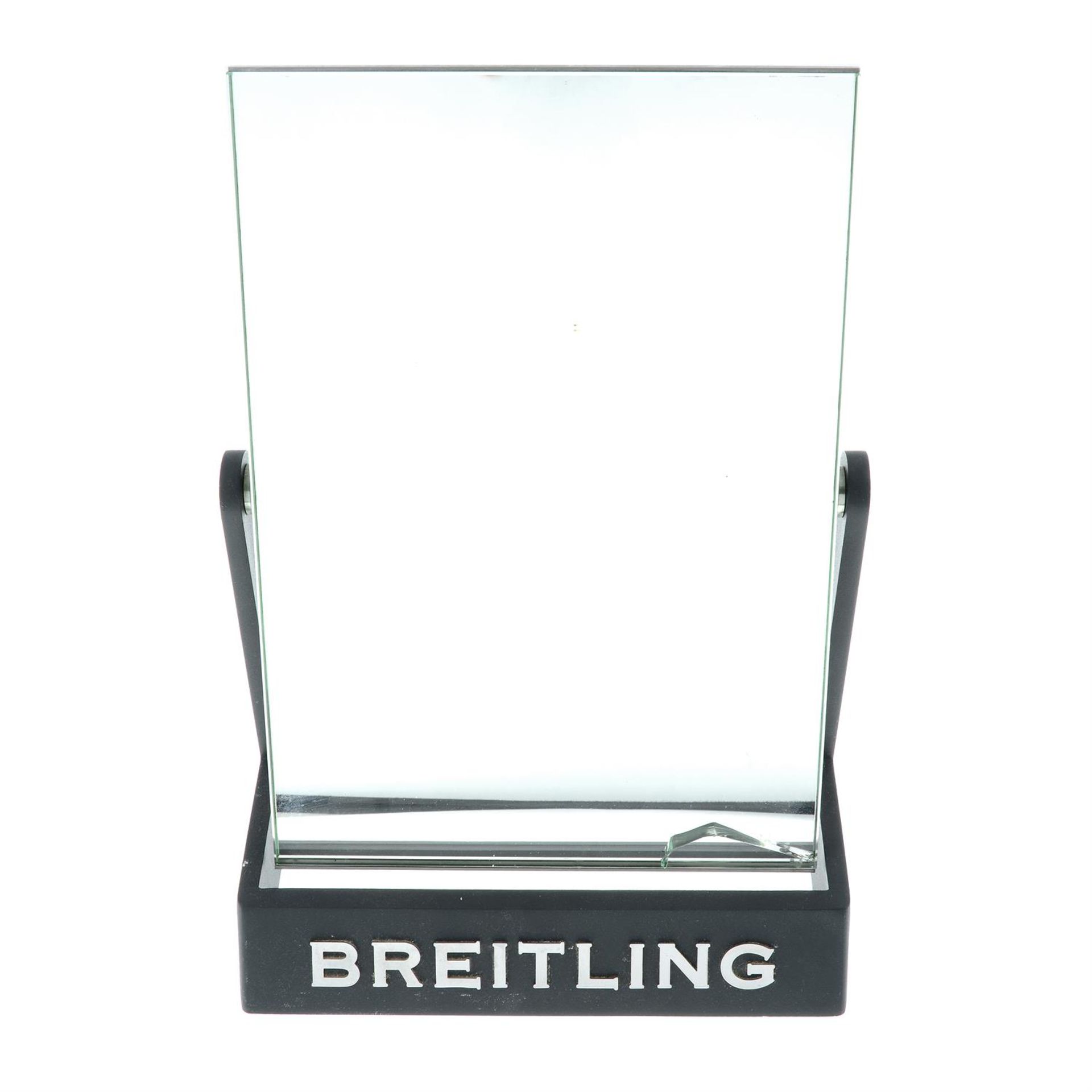 BREITLING - a boutique counter top mirror.