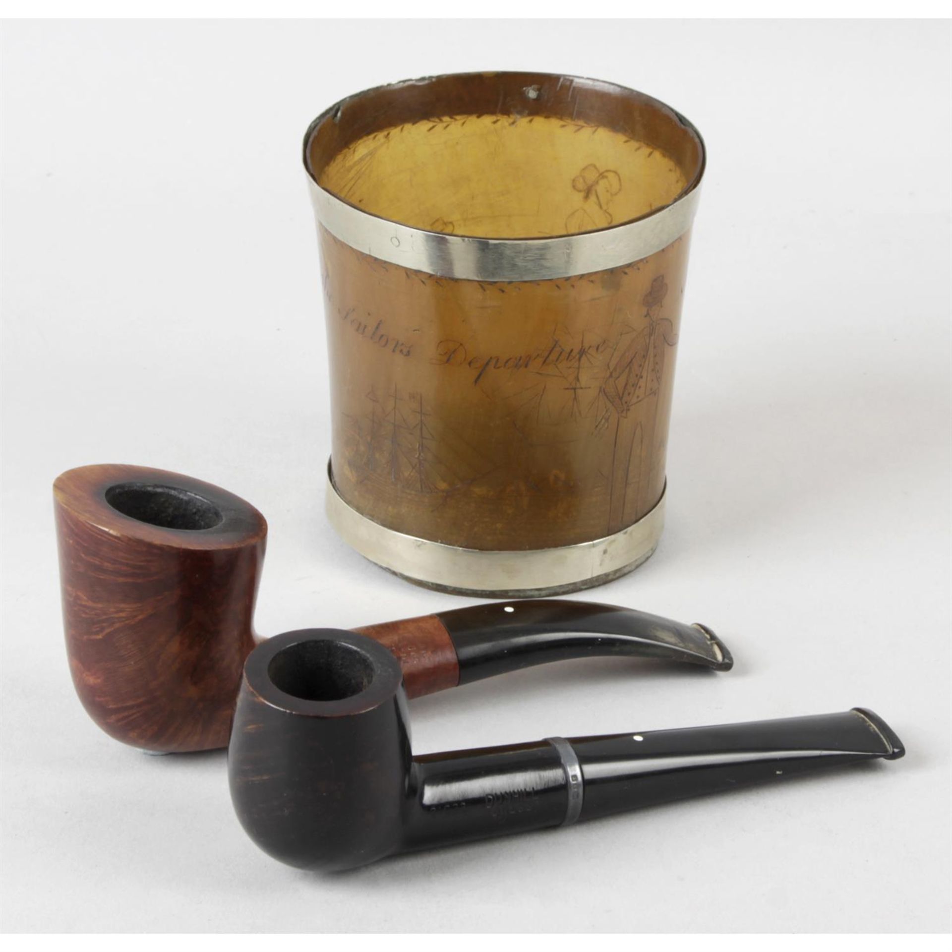 An early 19th horn beaker, together with three Dunhill pipes.
