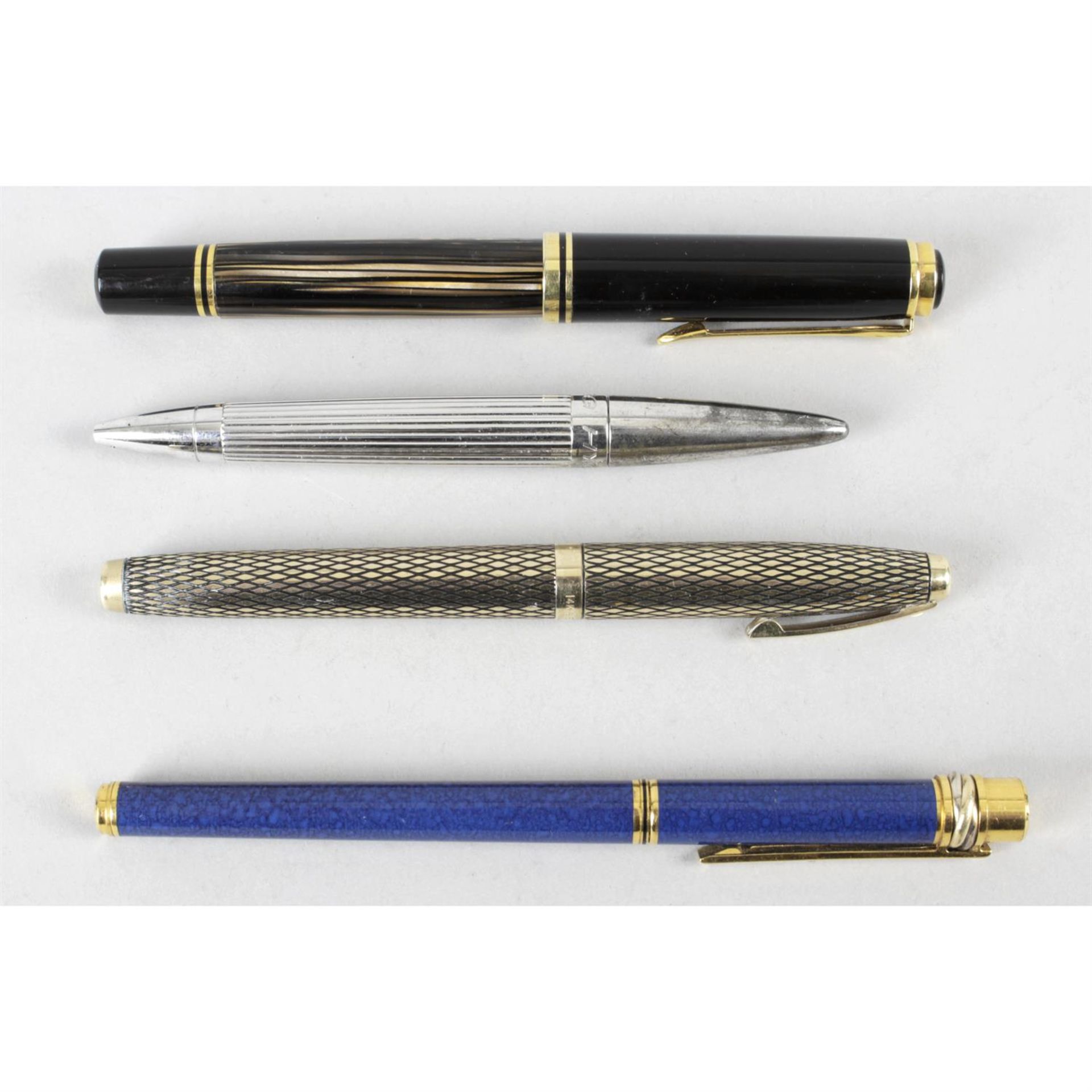 A Must De Cartier fountain pen, a Pelikan fountain pen, a Vorg Hysek propelling pen and a Sheaffer