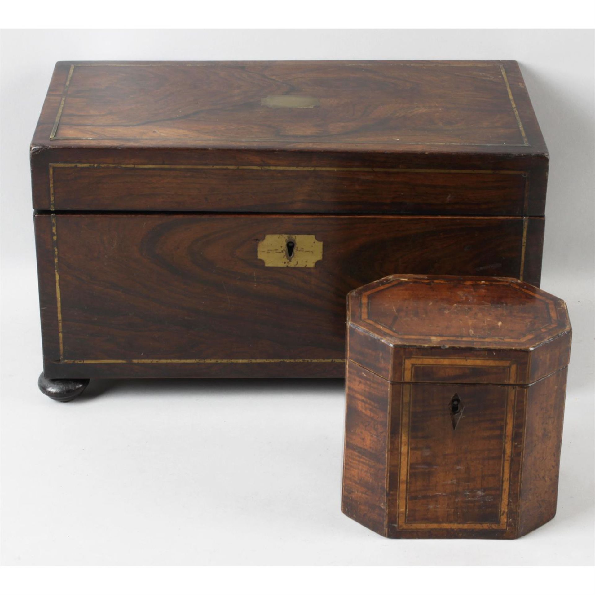 A 19th century rosewood tea caddy, together with a small, octagonal tea caddy. (2)