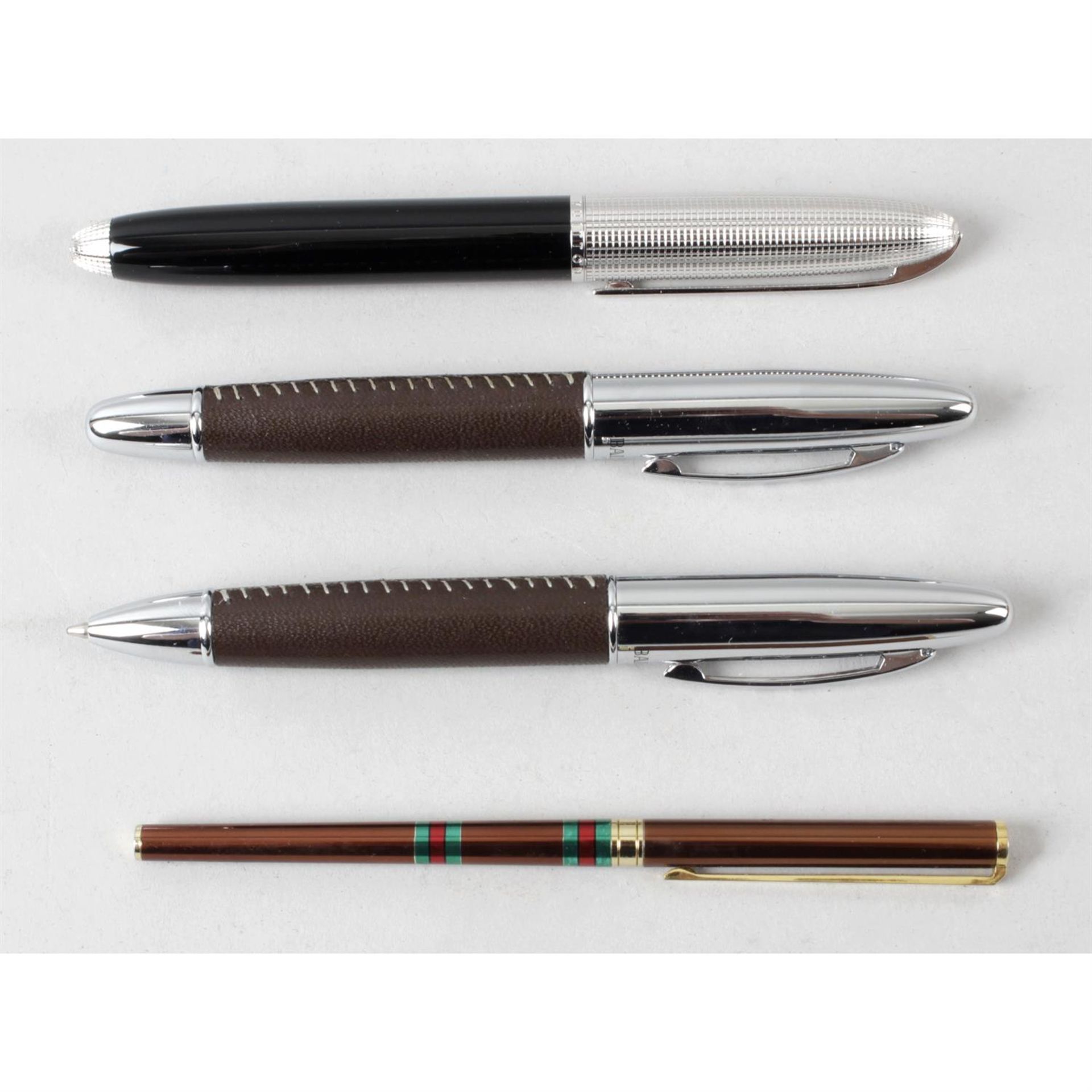 A mixed selection of assorted pens, to includ Gucci, Balmain and Yves Saint Laurent examples.