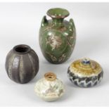 A Martin Brothers twin handled pottery vase, together with three similar examples A/F.