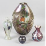 A selection of iridescent glass items, to include a vase with hand painted decoration, okra vases,