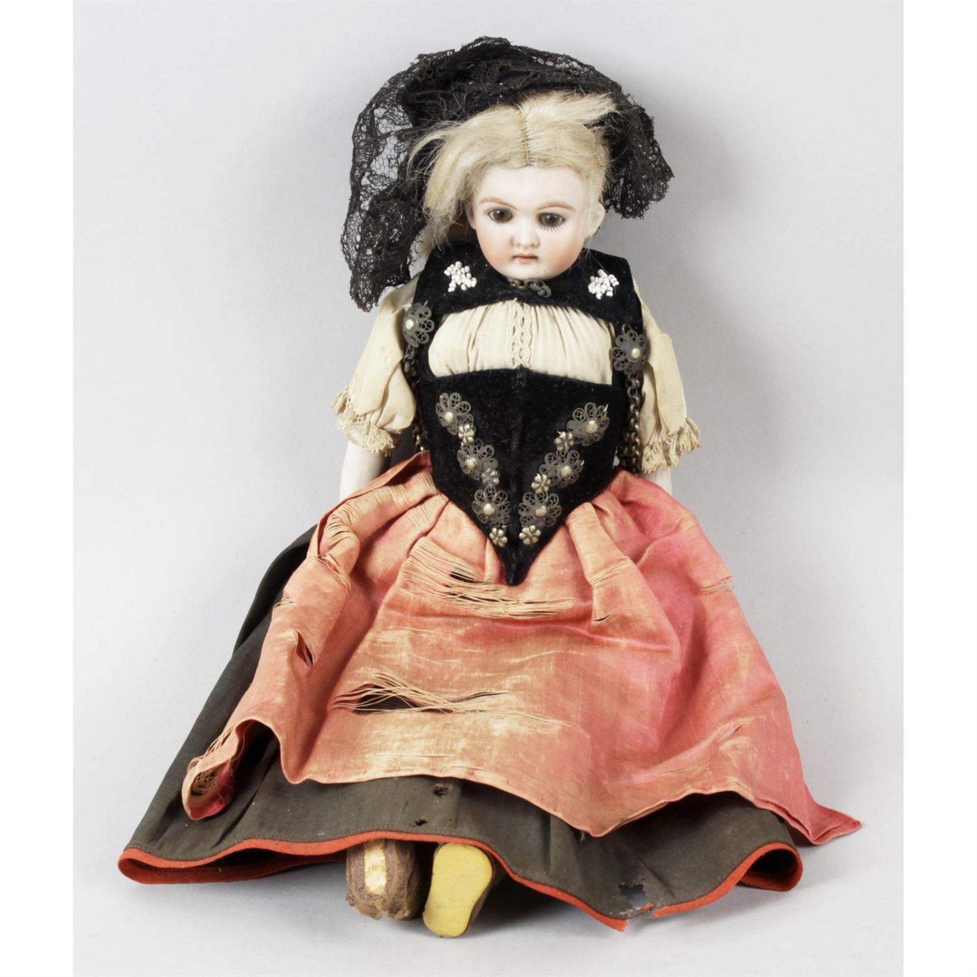 A Kling & Co bisque headed shoulder plate doll.